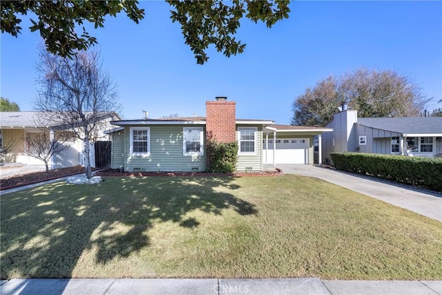 ranch-style house with a garage and a front yard