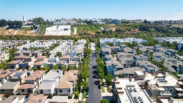 birds eye view of property with a residential view