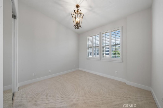 6011 Dawn Crk Unit 7, Playa Vista, CA 90094 - empty room featuring carpet floors, baseboards, and a chandelier