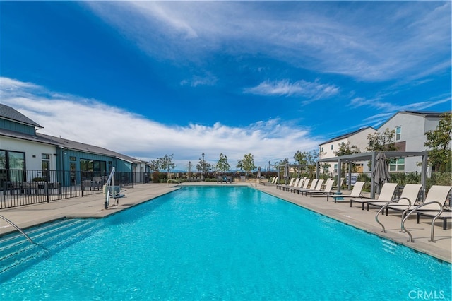 view of swimming pool with a patio