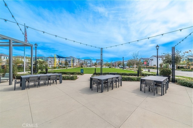 surrounding community with a patio area