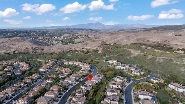 birds eye view of property featuring a residential view and a mountain view