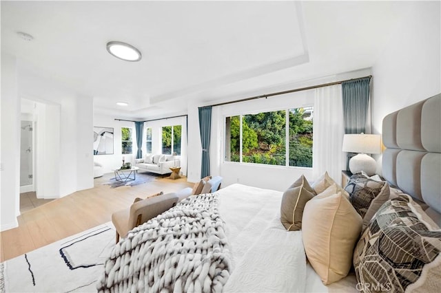 bedroom featuring light wood finished floors