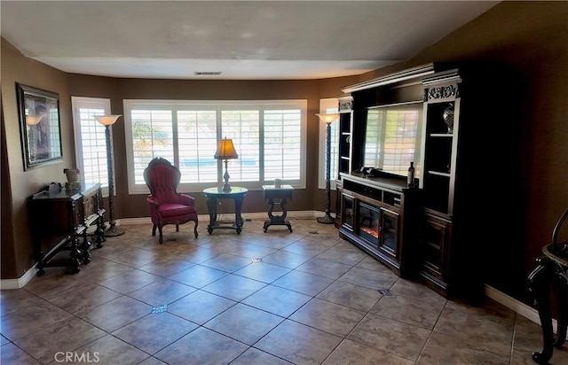 sitting room featuring light tile patterned floors