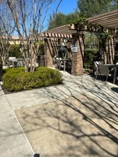 exterior space featuring a pergola