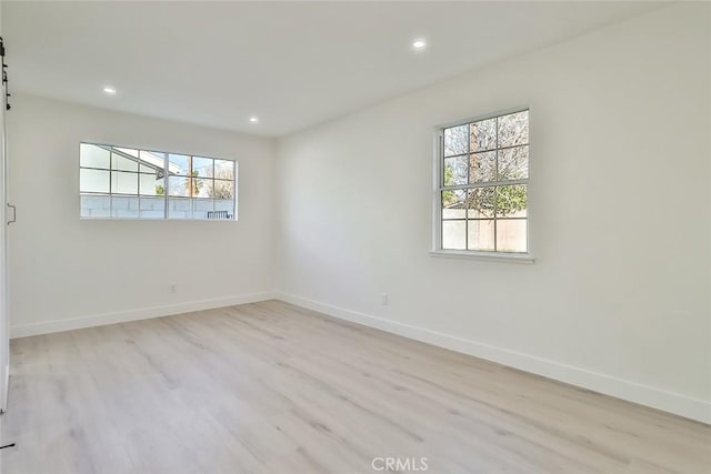 empty room featuring light hardwood / wood-style flooring