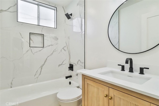 full bathroom with vanity, toilet, and tiled shower / bath combo