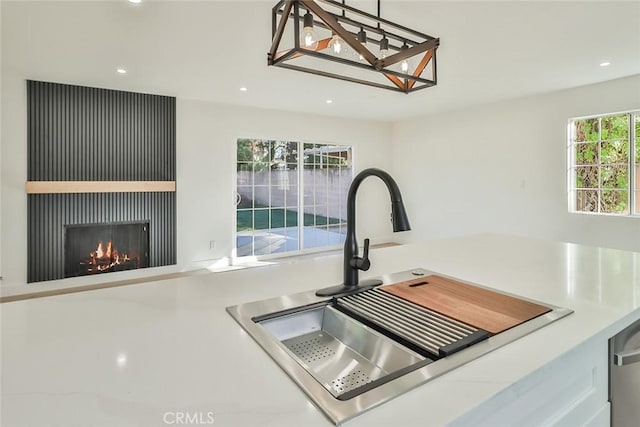 kitchen with sink and pendant lighting