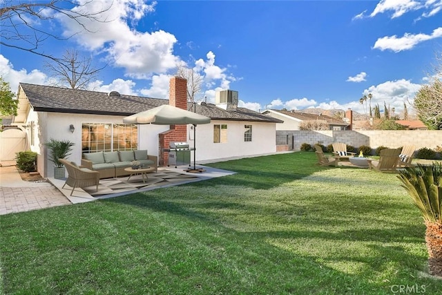 back of house featuring a lawn, central AC unit, a patio, and outdoor lounge area