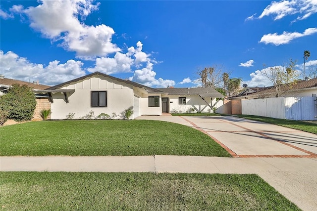 view of front of home with a front lawn