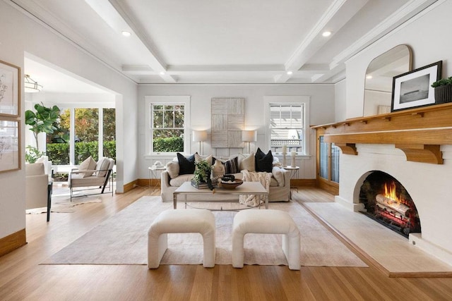 living room featuring coffered ceiling, beam ceiling, and light hardwood / wood-style floors