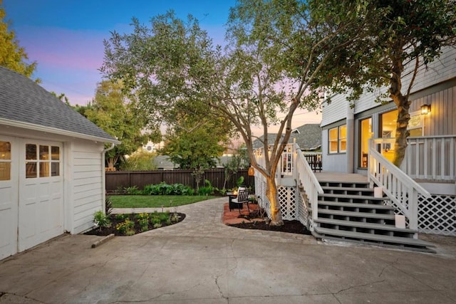 patio terrace at dusk with a wooden deck