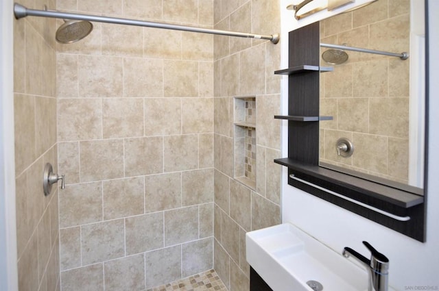 bathroom with a tile shower