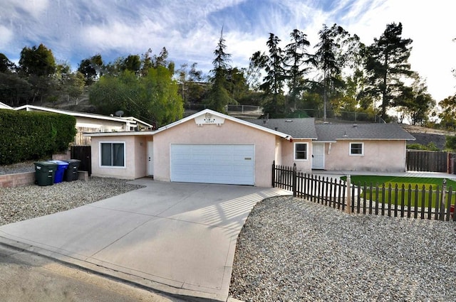 ranch-style house featuring a garage