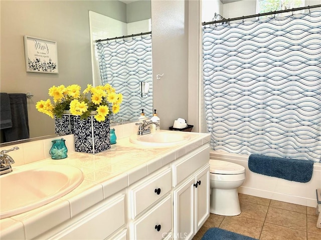 full bathroom with vanity, toilet, shower / bathtub combination with curtain, and tile patterned flooring