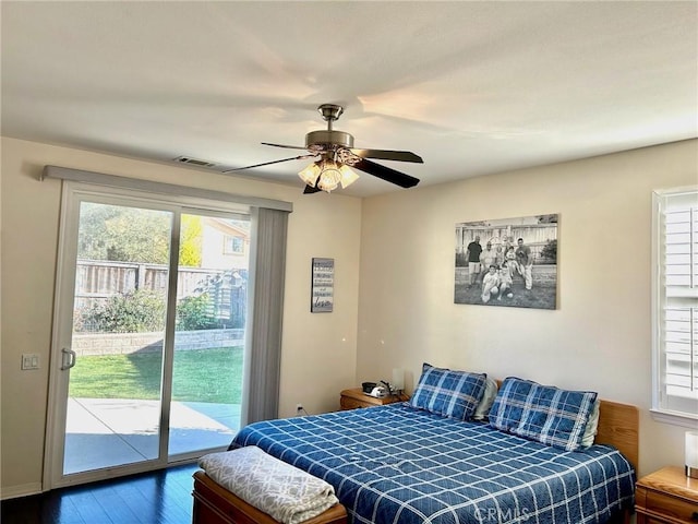 bedroom with wood-type flooring, access to exterior, and ceiling fan