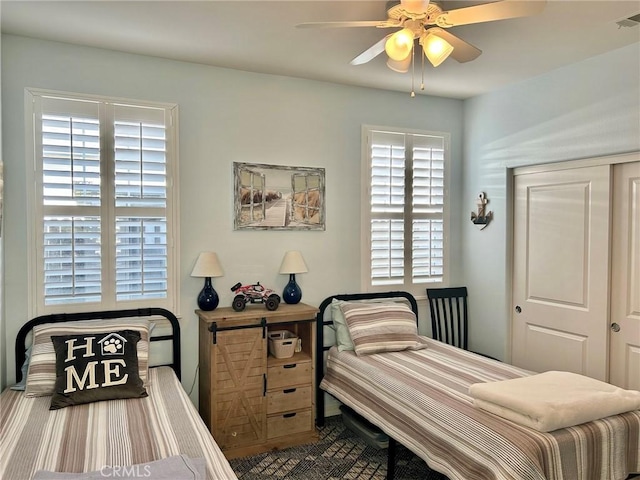 bedroom featuring ceiling fan