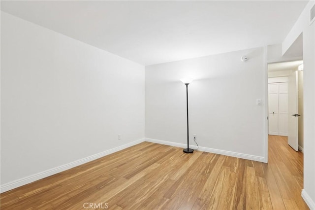 empty room with light wood-type flooring