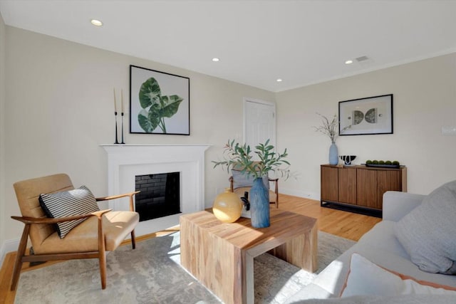 living room with light hardwood / wood-style floors