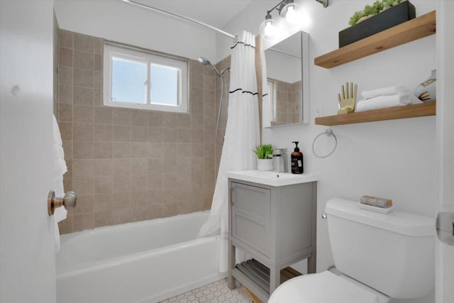 full bathroom with toilet, vanity, and shower / bathtub combination with curtain