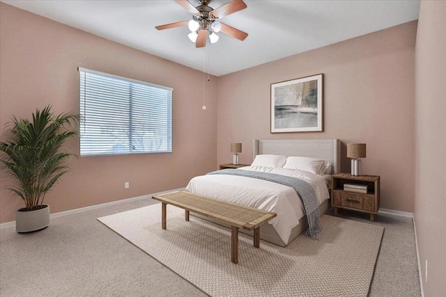 bedroom featuring ceiling fan and carpet floors