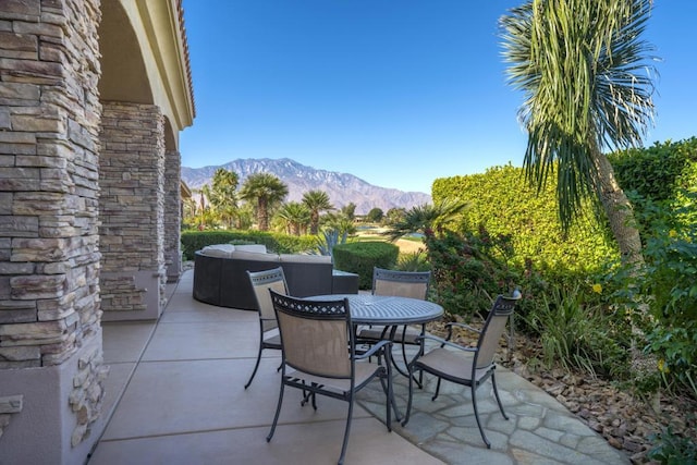 view of patio featuring a mountain view