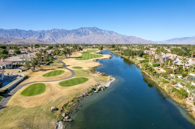 bird's eye view with a water and mountain view