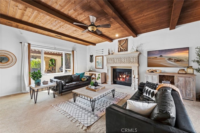 carpeted living room featuring beam ceiling, ceiling fan, and wood ceiling