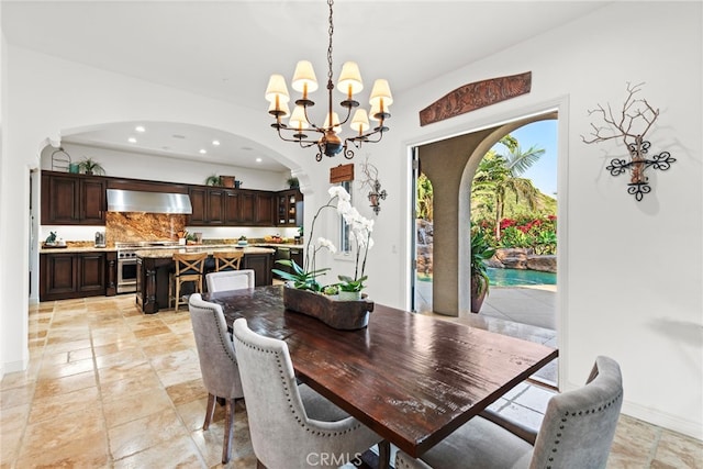 dining area with a notable chandelier