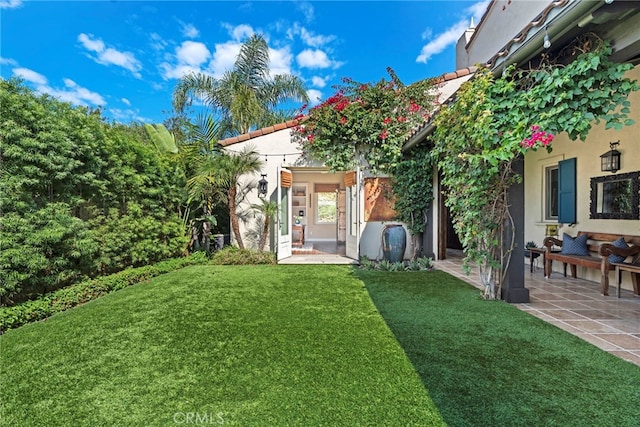 view of yard with a patio area