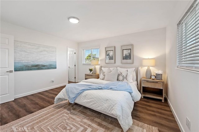 bedroom featuring dark hardwood / wood-style floors