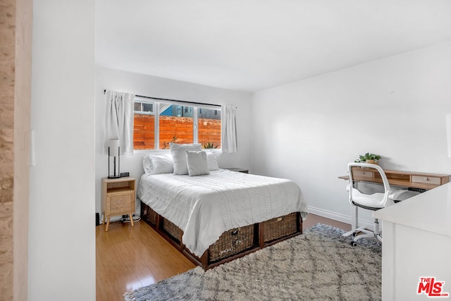 bedroom featuring light hardwood / wood-style flooring