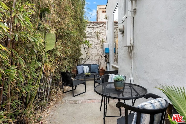 view of patio / terrace with an outdoor hangout area