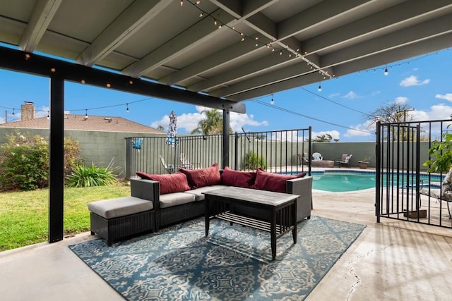 view of patio / terrace with a fenced in pool and an outdoor hangout area