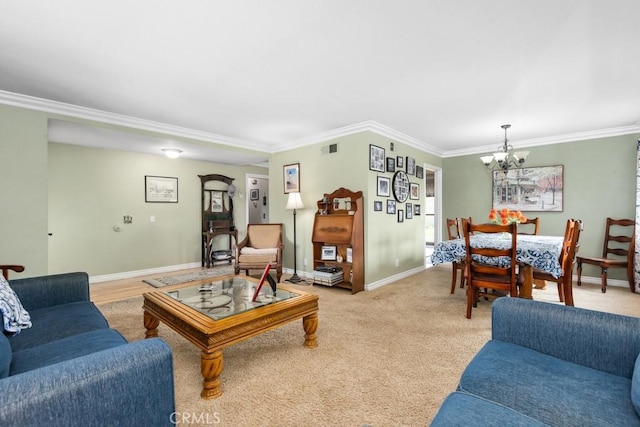 carpeted living room featuring ornamental molding and a notable chandelier