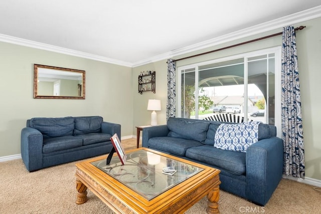 living room featuring ornamental molding and carpet flooring