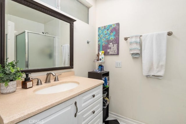 bathroom featuring vanity and walk in shower