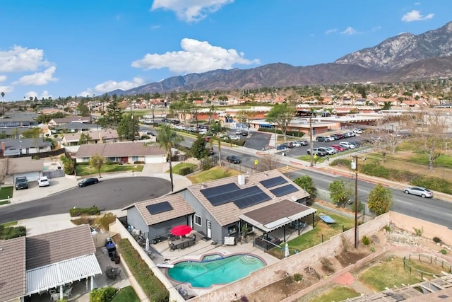 bird's eye view with a mountain view