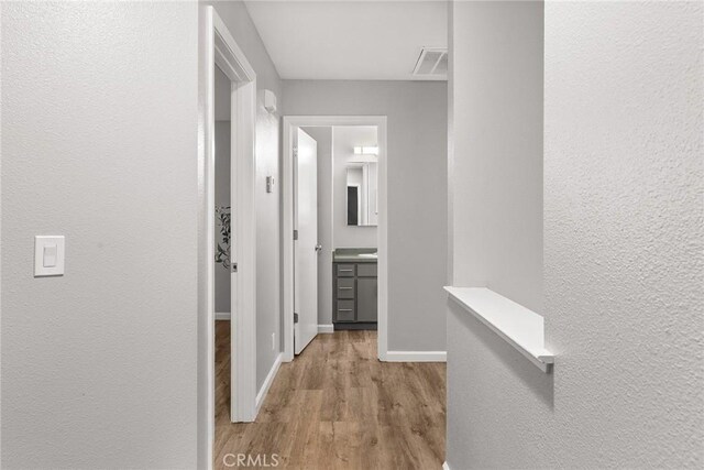 hall featuring light hardwood / wood-style flooring