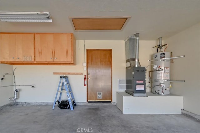 garage with heating unit and water heater