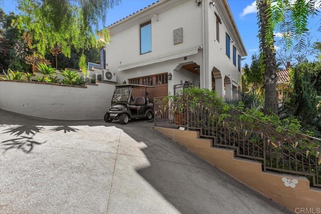 exterior space with a garage