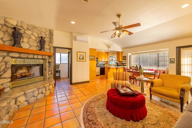 tiled living room with ceiling fan, a fireplace, vaulted ceiling, and an AC wall unit