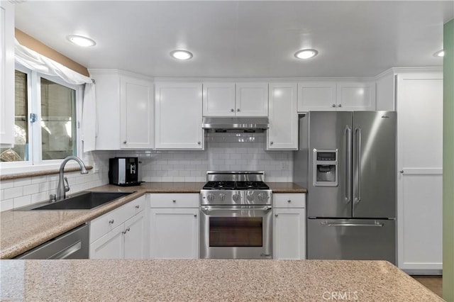 kitchen featuring sink, white cabinetry, and appliances with stainless steel finishes