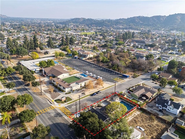 drone / aerial view featuring a mountain view