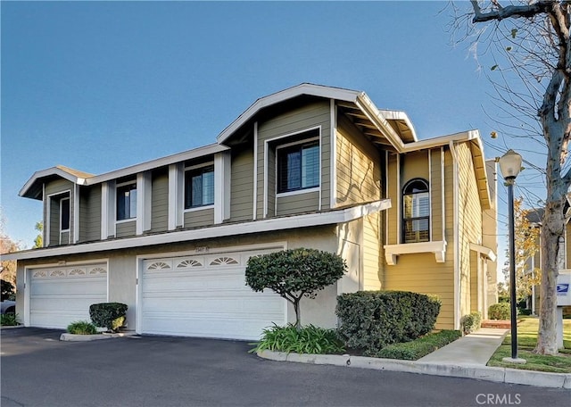 view of property featuring a garage