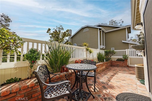 view of patio / terrace featuring cooling unit