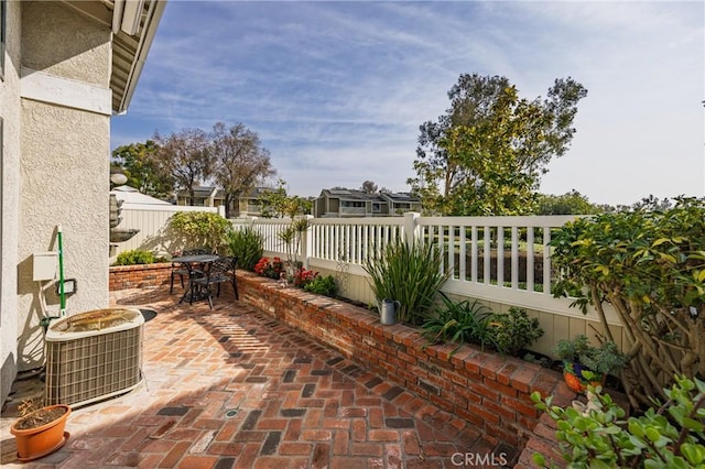 view of patio / terrace featuring central air condition unit