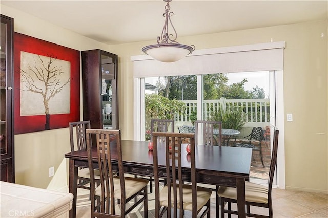 view of tiled dining space