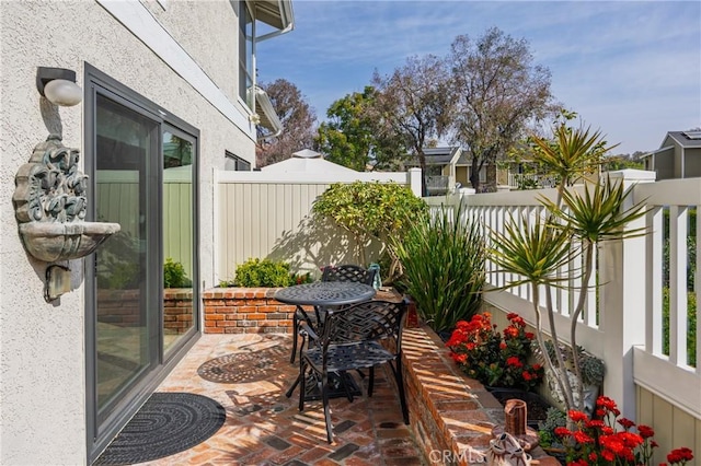 balcony featuring a patio area