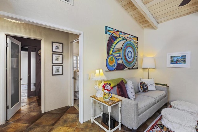 living room featuring lofted ceiling with beams and wood ceiling